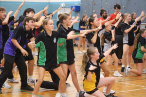 Group of youth in uniforms enjoying exercise